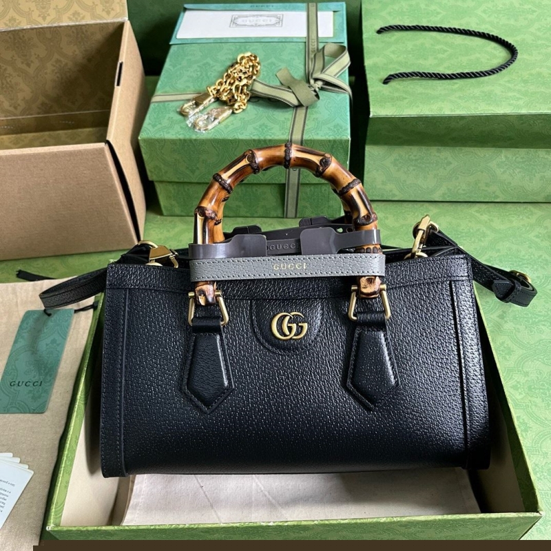 G*u*i top handle bags